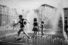 Children Playing in City Water Feature
