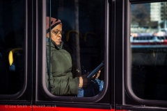 Woman on a London Bus
